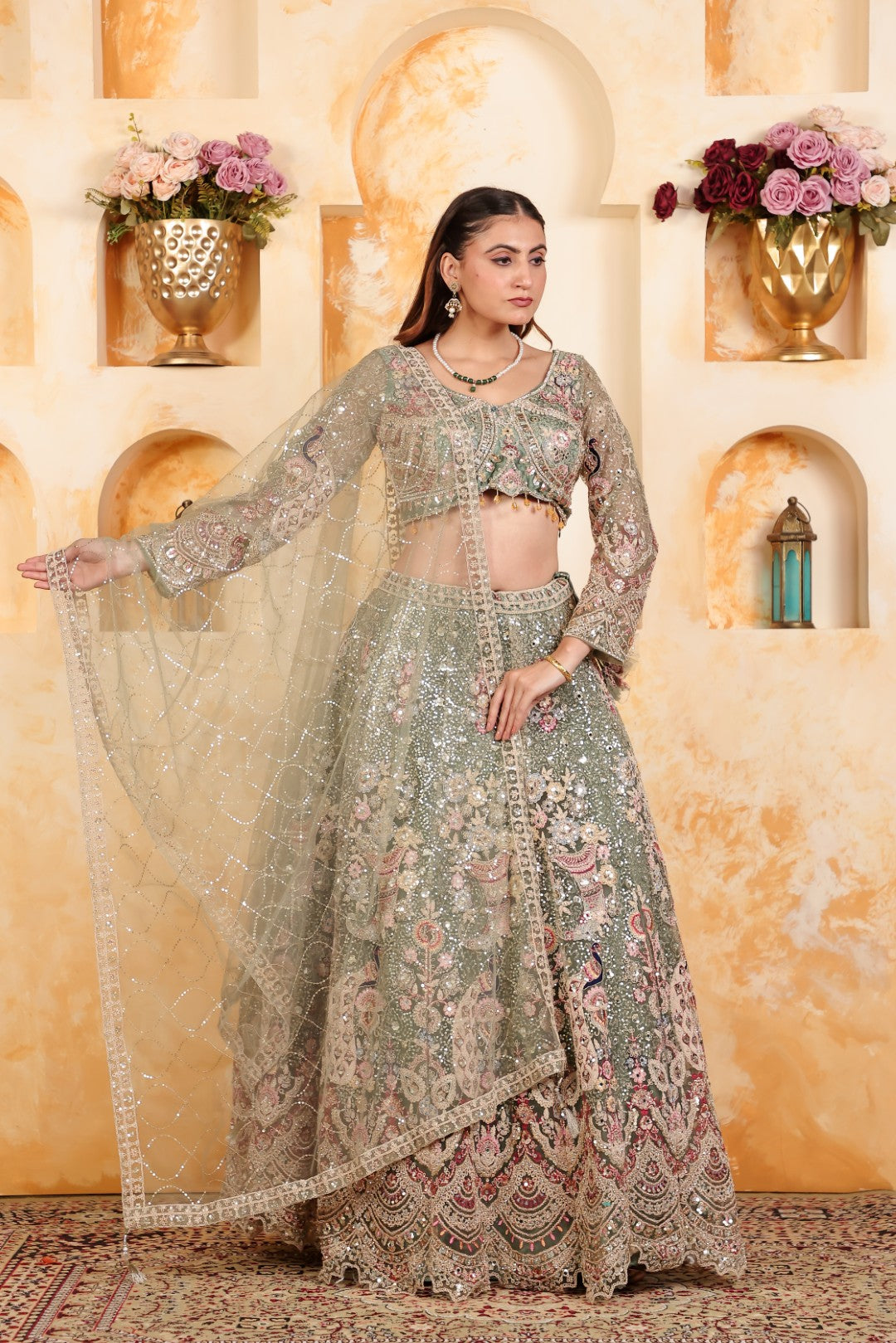 Pista Green Net Lehenga with Heavy Embroidery and Matching Blouse & Dupatta
