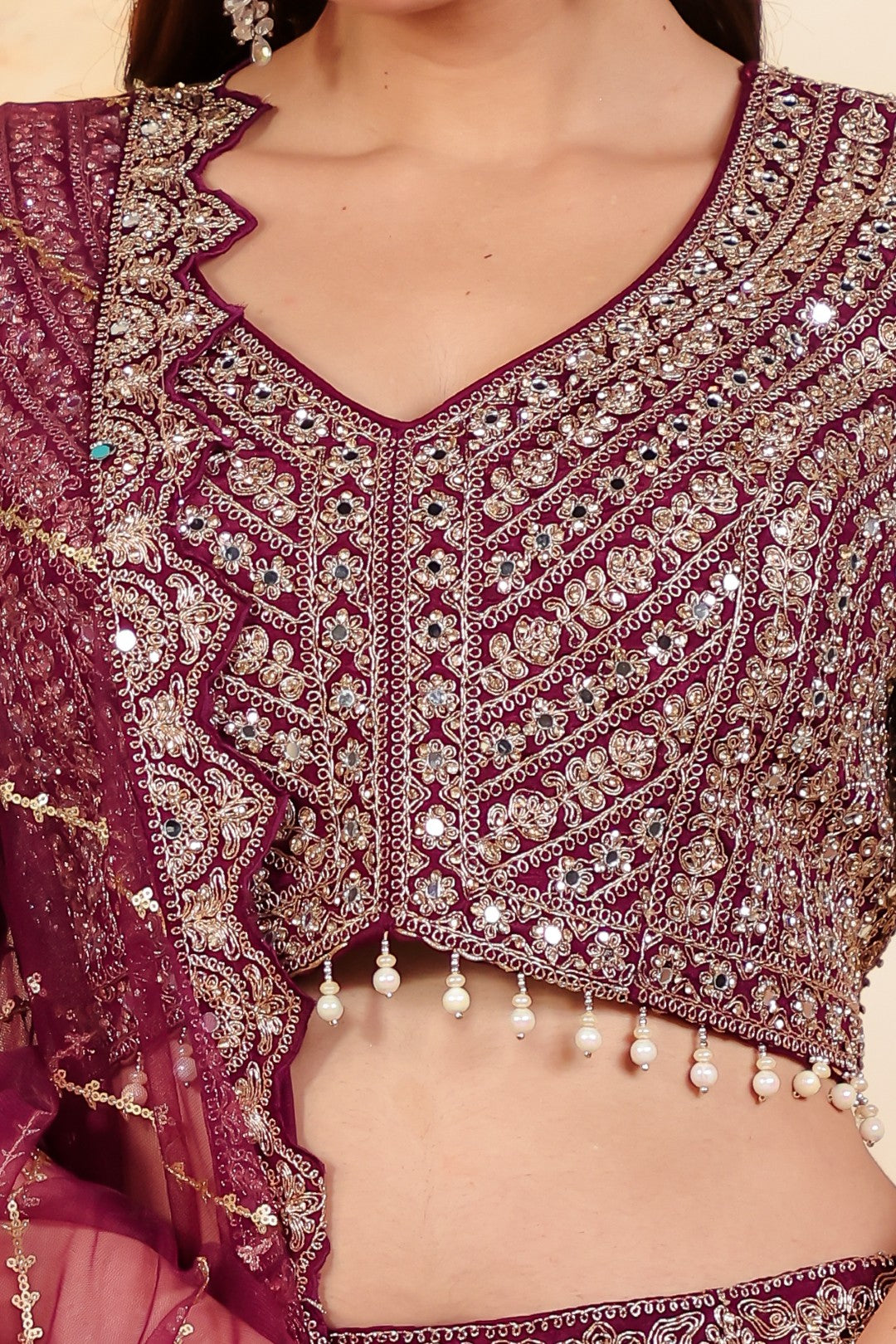 Wine Chinon Lehenga with Heavy Zari work and Matching Blouse with Net Dupatta