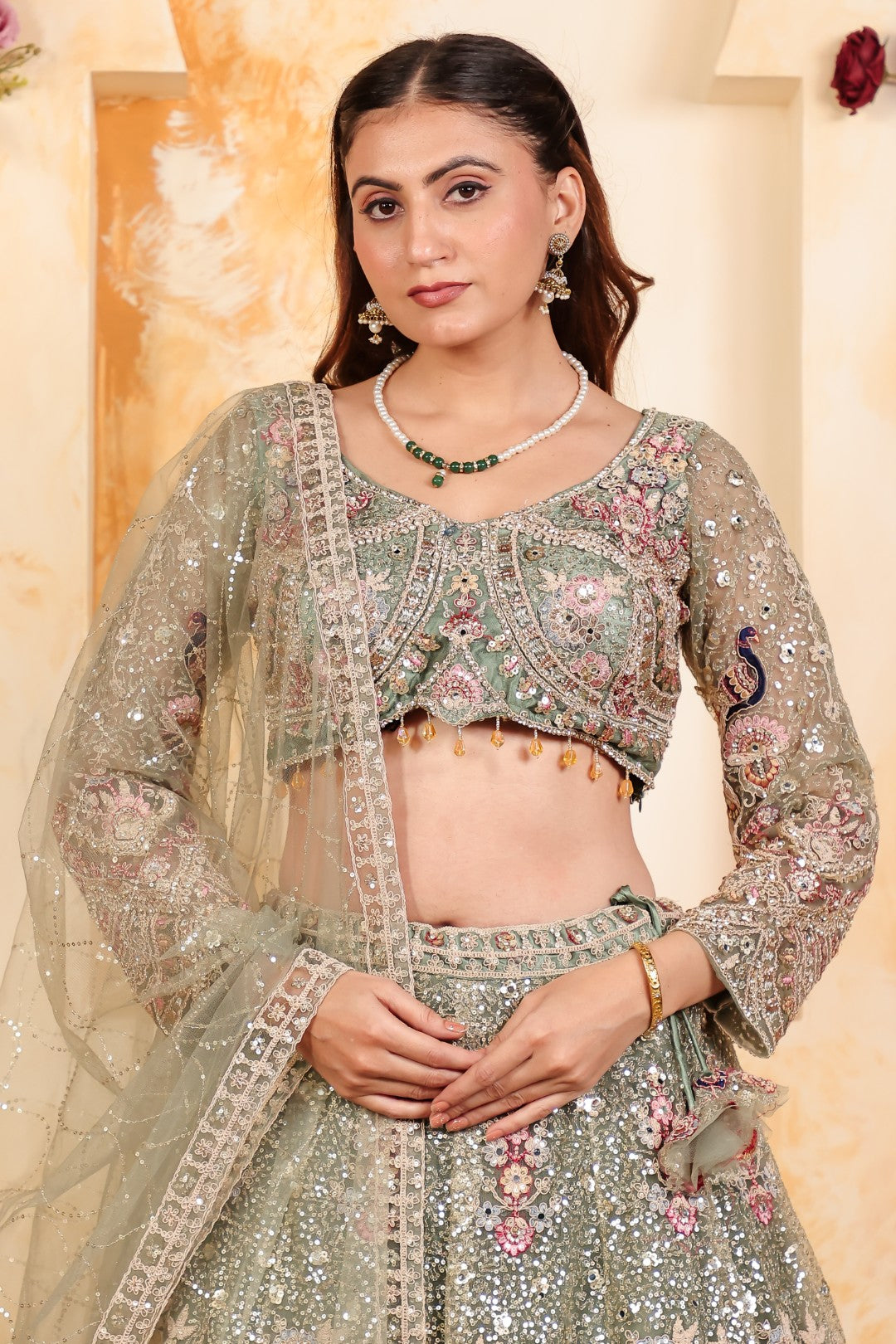 Pista Green Net Lehenga with Heavy Embroidery and Matching Blouse & Dupatta